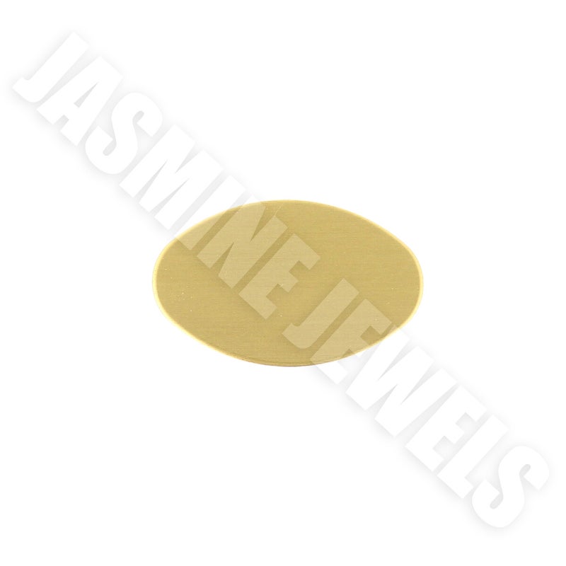 Kaiverruslaatta satiiniharjattu messinki 27 x 17 mm, ovaali.